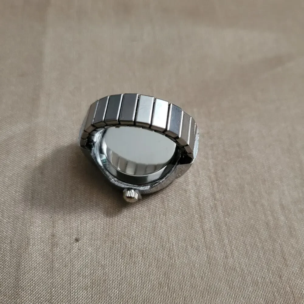 Pink and silver watch ring